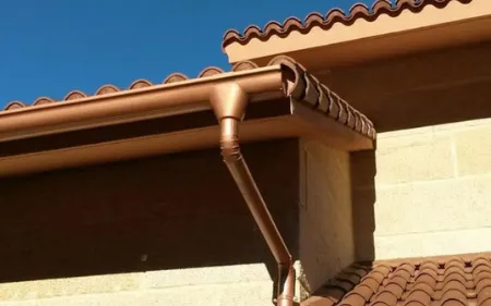 instalación de canalones de aluminio continuo en vivienda de Santander, Cantabria
